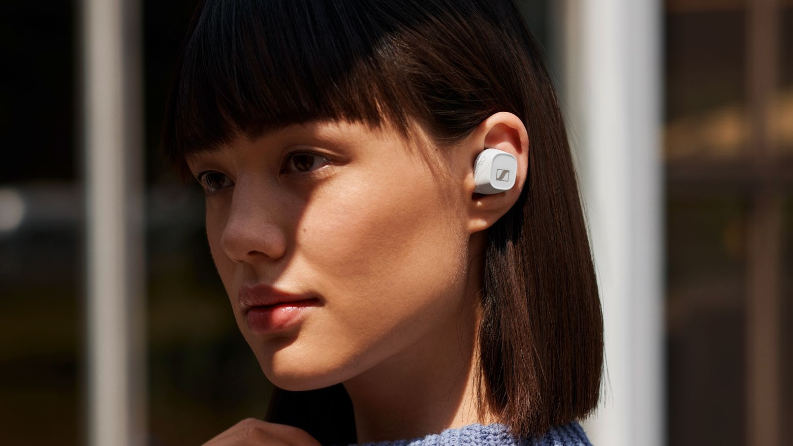 Sennhesier CX-400BT wireless earbuds worn by a young lady
